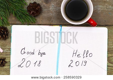 Cup Of Coffee Christmas Fir Tree With Cones And Notebook With Labeled :2019 Hello, Goodbye 2018 On W