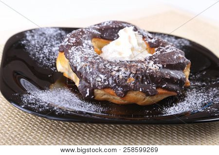 Homemade Traditional Polish Sweets Doughnuts On Black Plate.