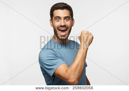 Goal! Emotional Male Celebrating Victory And Acting As If He Is Winner, Raising Fist In Deep Emotion