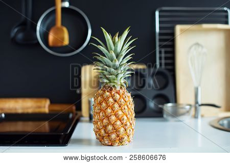 Pine Apple Tropical Fruit On Kitchen Table Preparation Cooking Accessories Kitchen Composition Black