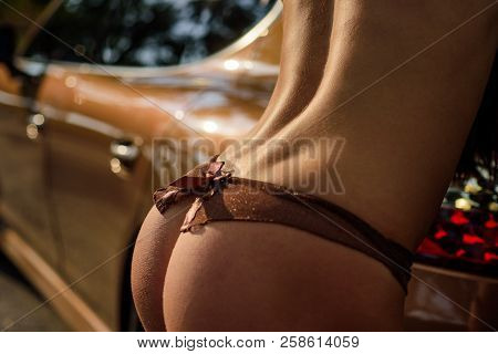 Silicone Implants Concept. Lingerie Model And Underwear. Luxury Ass. Huge Buttocks. She Is Wearing H