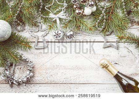 Christmas Composition With Fir Tree Branches And Christmas Decorations On White Wooden Background, T