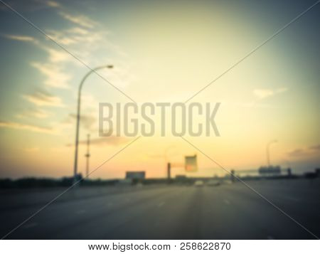 Filtered Tone Blurry Background Usual Traffic Condition On Highway Interstate At Sunrise In Usa