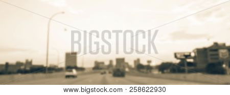 Panoramic Blurry Background Long Vehicles Commute On Interstate Highway At Sunrise