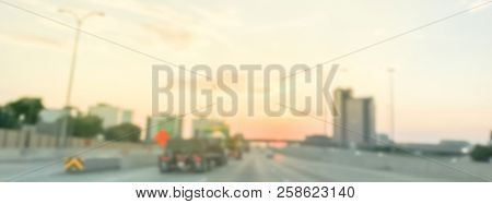 Panoramic Blurry Background Long Vehicles Commute On Interstate Highway At Sunrise