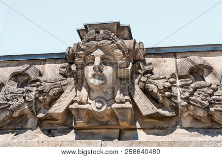 Berlin, Germany - May 27, 2017: Close-up For Face Sculputure On The Roof Of Bundestag In Berlin, Ger