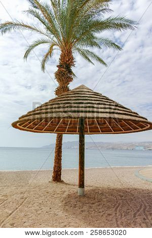 Beautiful Public Sandy Beaches On Red Sea In Eilat With Stro Umbrellas, Luxury Vacation Spa Resorts