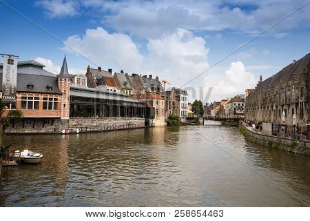 Ghent, Belgium - August 14, 2015 - Old Colorful Traditional Houses Along The Canal In The Historical