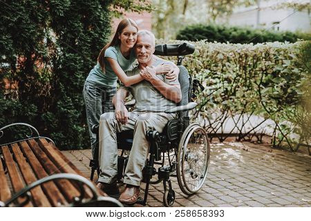Disease Old Man. Young Girl With Old Man. Businessman And Young Girl On Wheelchair. Happy Family On 