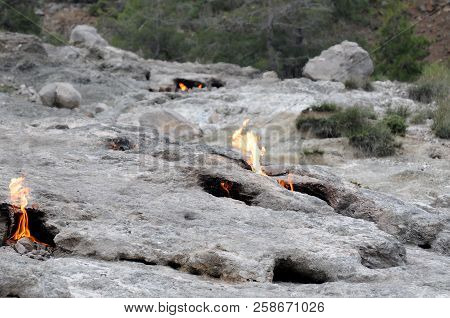 This Flaming Rock (yanartas ) Is Generally Believed To Be The Ancient Mount Chimera (antalya, Turkey
