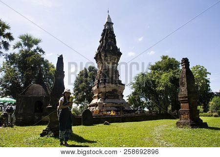 Thai Woman Travel Visit And Respect Praying Chedi Or Stupa Phra That Kong Khao Noi In Yasothon, Thai