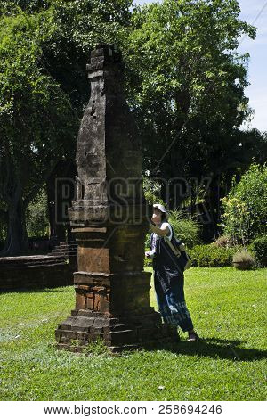 Thai Woman Travel Visit And Respect Praying Chedi Or Stupa Phra That Kong Khao Noi In Yasothon, Thai