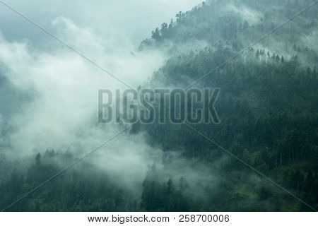 Green Mountains In The Smoke And Clouds
