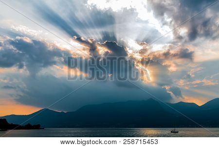 Golden Sunset Before The Storm Over The Lake Maggiore In Luino, Italy
