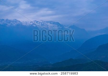 Begnas Tal, Nepal With The Annapurna Himalaya Visible In The Background At Sunset