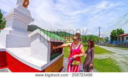 Pokhara, Nepal - April 10, 2018: The People Near Stoned Sculpture Of Namgyal Chorten At Nepal