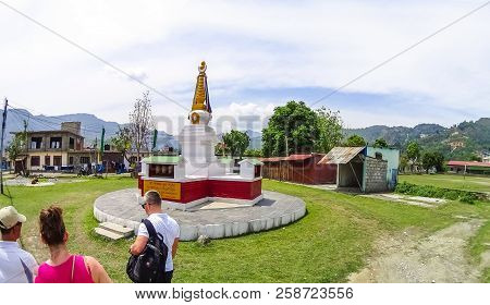 Pokhara, Nepal - April 10, 2018: The People Near Stoned Sculpture Of Namgyal Chorten At Nepal