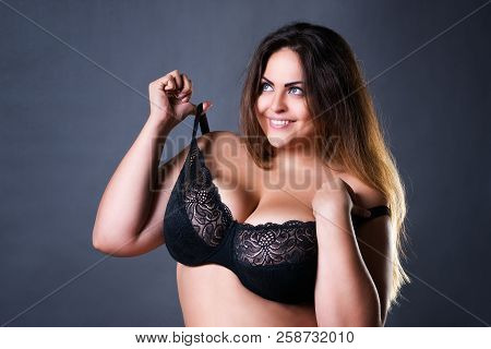 Plus Size Sexy Model In Black Bra, Fat Woman With Big Natural Breast On Gray Studio Background, Over