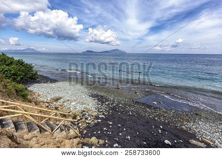 Steps Leading Down To Blue Stone Beach Near Ende, Indonesia.
