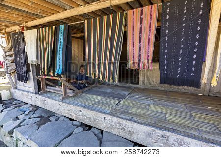 Luba, Indonesia - May 19: An Unidentified Woman Weaves  In Luba,  Indonesia On May 19, 2017.