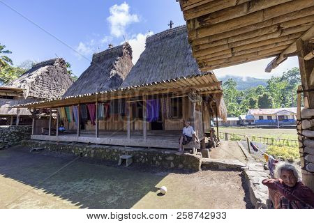 Luba, Indonesia - May 19: Unidentified People Relax In Front Of Their Houses On May 19, 2017 In Luba