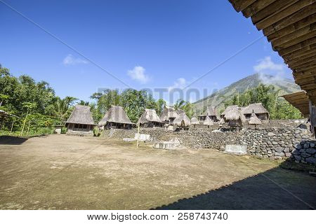 The Mount Inerie Stratovolcano And The Luba Traditional Village In Flores, Indonesia.