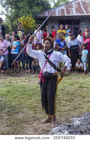 Bajawa, Indonesia - May 19: An Unidentified Village Elder Dances During A Traditional Boxing Match N