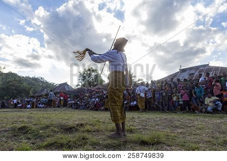 Bajawa, Indonesia - May 19: An Unidentified Man Performs Traditional Dance At A Boxing Event Near  B