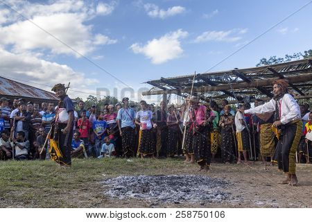 Bajawa, Indonesia - May 19: Unidentified Village Elders Dance At A Boxing Match Near  Bajawa In East