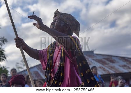 Bajawa, Indonesia - May 19: An Unidentified Village Elder Dances With Ceremonial Garb Near Bajawa In