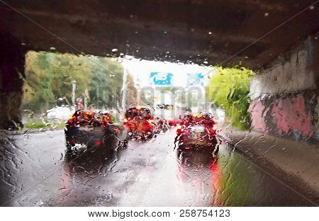 Driving A Car In The Rain Storm