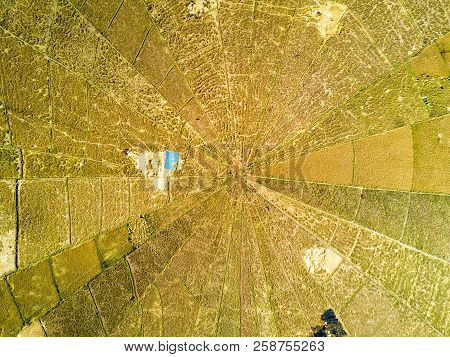 Aerial View Of The Patchwork Of Rice Plots At The Spider Rice Fields In Ruteng, Indonesia.