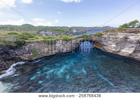 Clear Blue Waters At Broken Beach On The Island Of Nusa Penida In Indonesia.