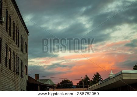 A Pink Sky At Dusk From A Small Town