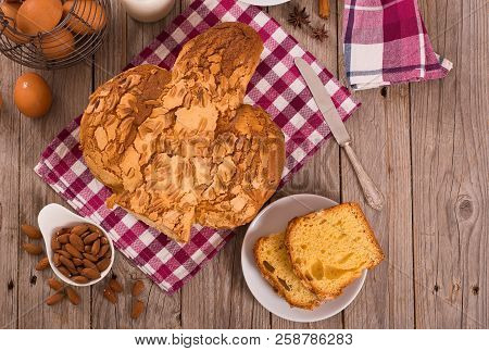Easter Dove Bread (colomba Pasquale) On Wooden Table.