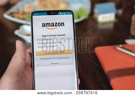 Chiang Mai,thailand - Sep 09, 2018 : Oneplus6 Digital Mobile Phone Showing Amazon Logo And Credit Ca