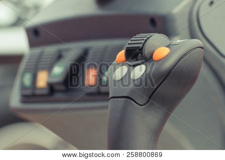 Closeup Of Operating Control Panel With Buttons In Truck, Agricultural Or Industrial Machine Or Othe