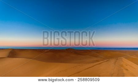 Sunrise In The Sahara Desert Next To M'hamid In Morocco