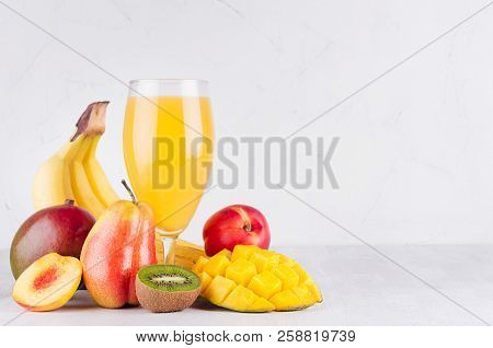 Homemade Healthy Beverage - Multi Fruits Juice Of Red, Yellow, Green, Orange Fruits On Soft Light Wh