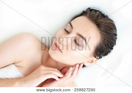 Portrait Of Young Sexy Beauty Caucasian Female Woman Adult With Clean Pure Skin Taking Spa Relaxing 