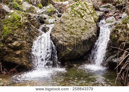Autumn Waterfall With Rocks And Leaves In Troodos Mountains In Cyprus