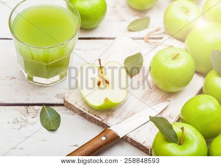 Glass Of Fresh Organic Apple Juice With Granny Smith And British Bramley Apples On Wooden Background