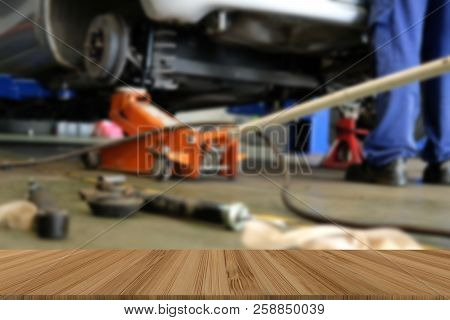 Car Lift Up For Shock Absorber & Spring Replacement In Auto Repair Garage