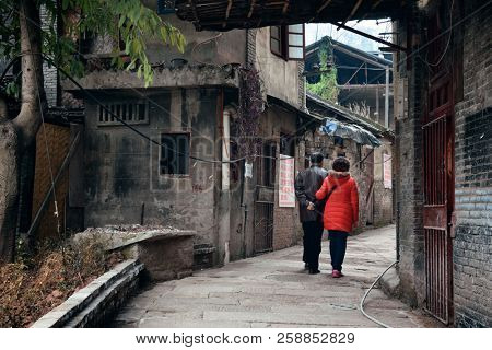 CHONGQING, CHINA â MARCH 13: Xiahao Old street with buildings on March 13, 2018 in Chongqing. With 17M population, it is the most populous Chinese municipality.