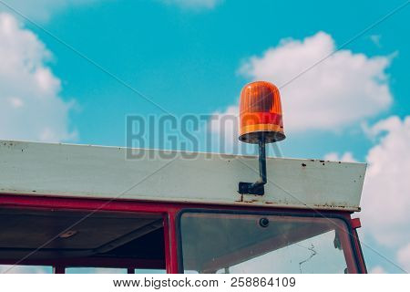 Old Tractor Beacon Light Mounted On The Roof Of Agricultural Vehicle