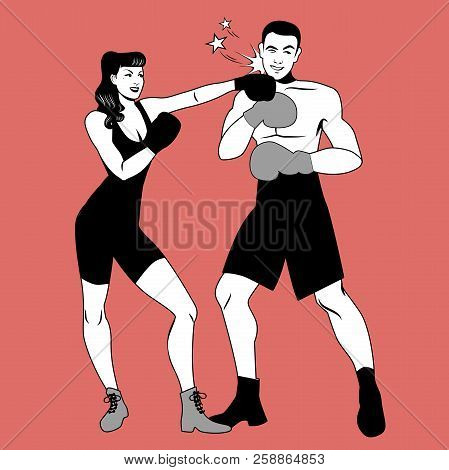 The War Of The Sexes. Beautiful Girl Boxer Hitting Her Handsome Opponent With A Left Hook