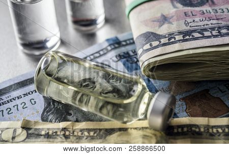 Vials With Different Substances Over Dollar, Concept Of Copayment