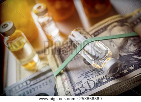 Vials With Different Substances Over Dollar, Concept Of Copayment