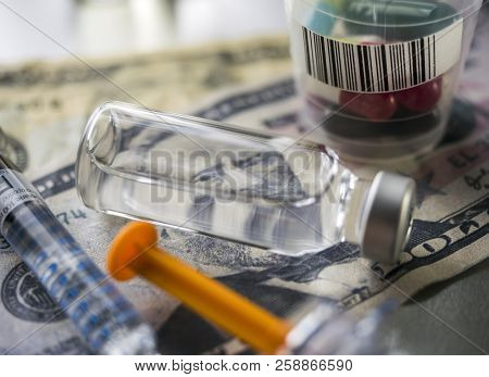 Vials With Different Substances Over Dollar, Concept Of Copayment