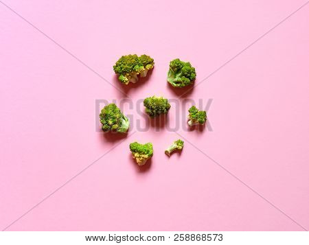 Top View Of A Minimalistic Greent Cauliflower Over A Pink Background With Copyspace.